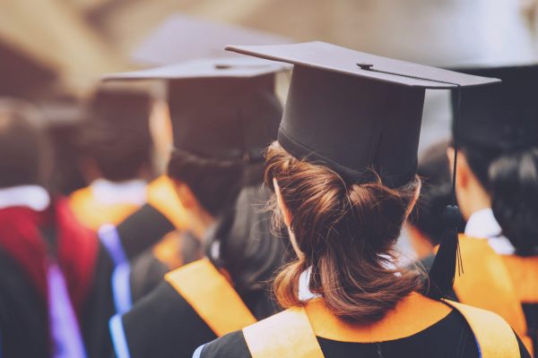 graduation,Student hold hats in hand during commencement success graduates of the university,Concept education congratulation.Graduation Ceremony,Congratulated the graduates in University.