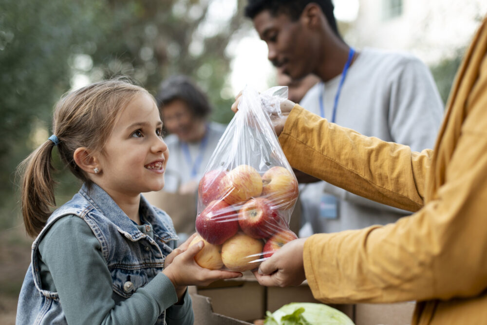 close-up-people-holding-apples-bag